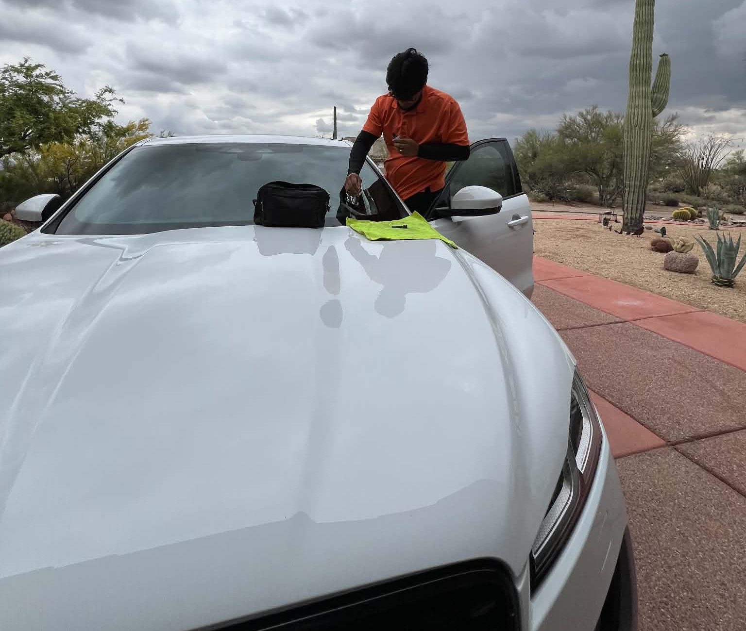 Technician performing a rock chip repair